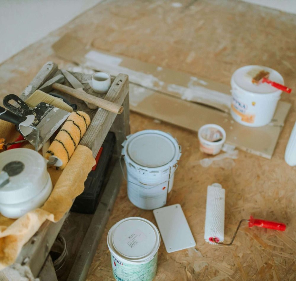 Painting Tips Singapore – Professional Painter Prepping Wall Surface for Smooth Interior Painting Finish